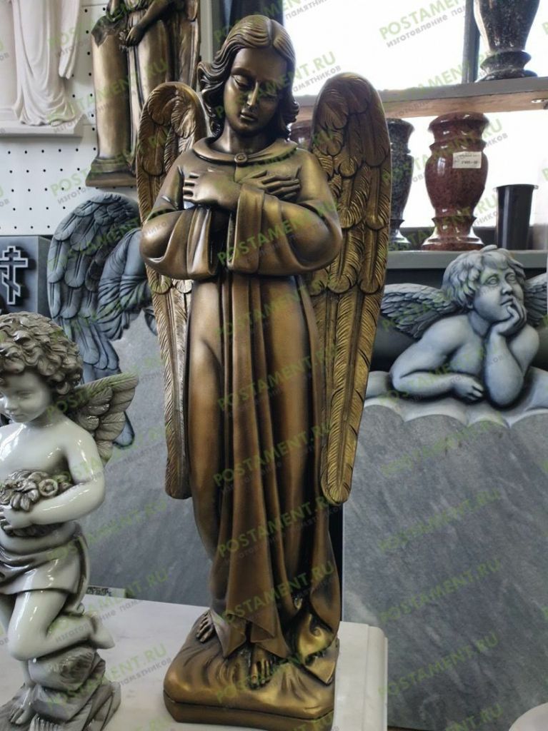 Скульптура бронзового ангела Скульптура бронзового ангела